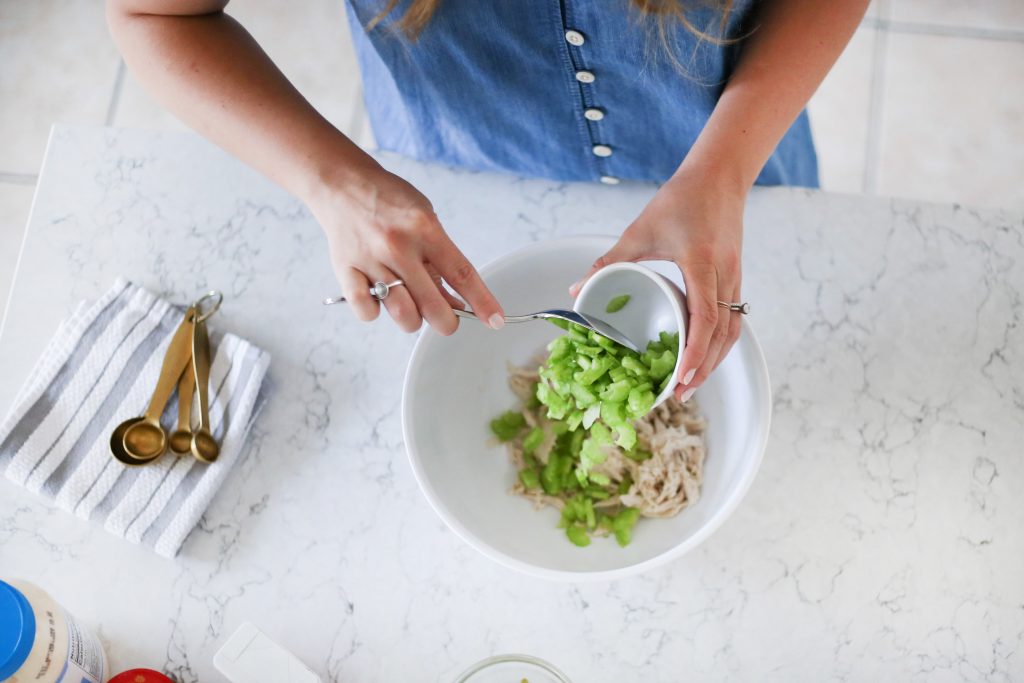 Mixing spicy chicken salas