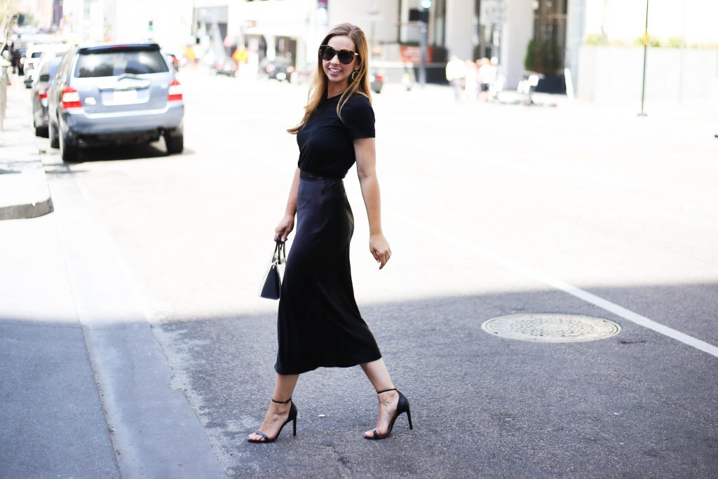 girl walking across street