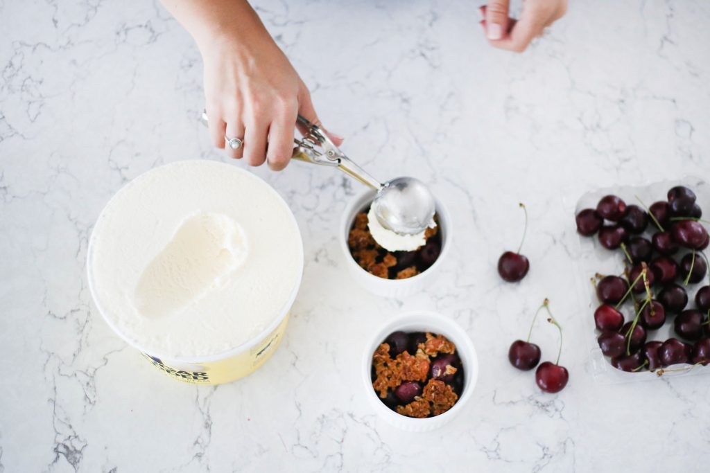 Adding ice cream to finish off dessert