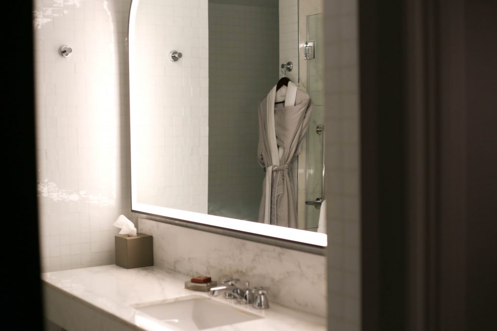 Mirror and vanity in bathroom 